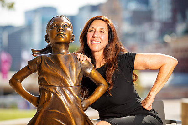 Kristen Visbal with Fearless Girl sculpture, Federation Square, Melbourne, Australia