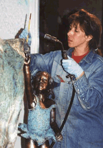 Applying a chemical patina to a hot surface